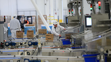 A Mars associate working in a warehouse